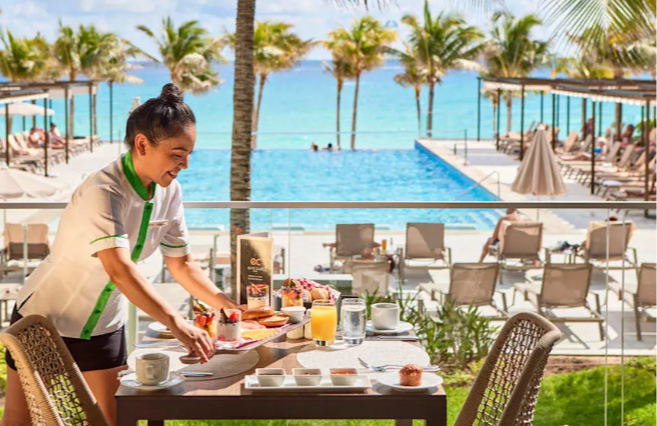 Riu Palace Kukulkan Cancun Hotel Zone Mexico Kukulkan Boulevard Breakfast on outdoor terrace with pool view